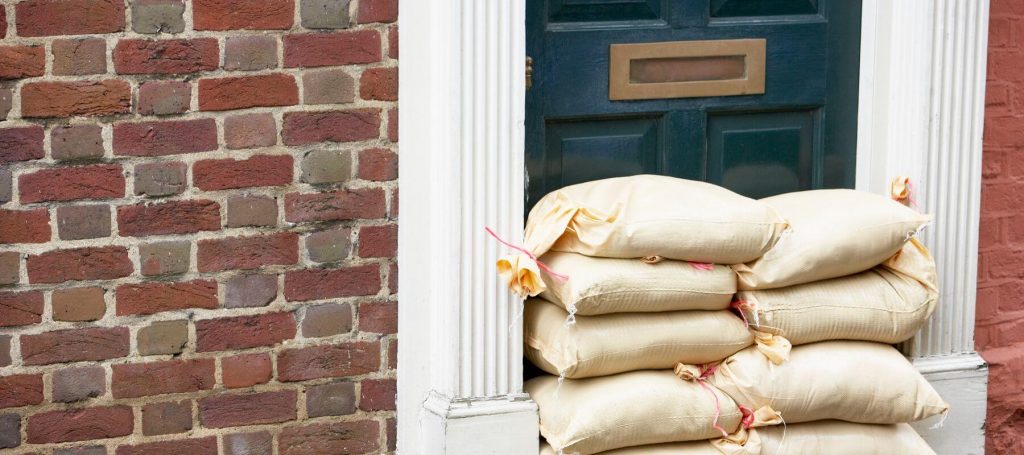 Flooding sacks applied to a doorway