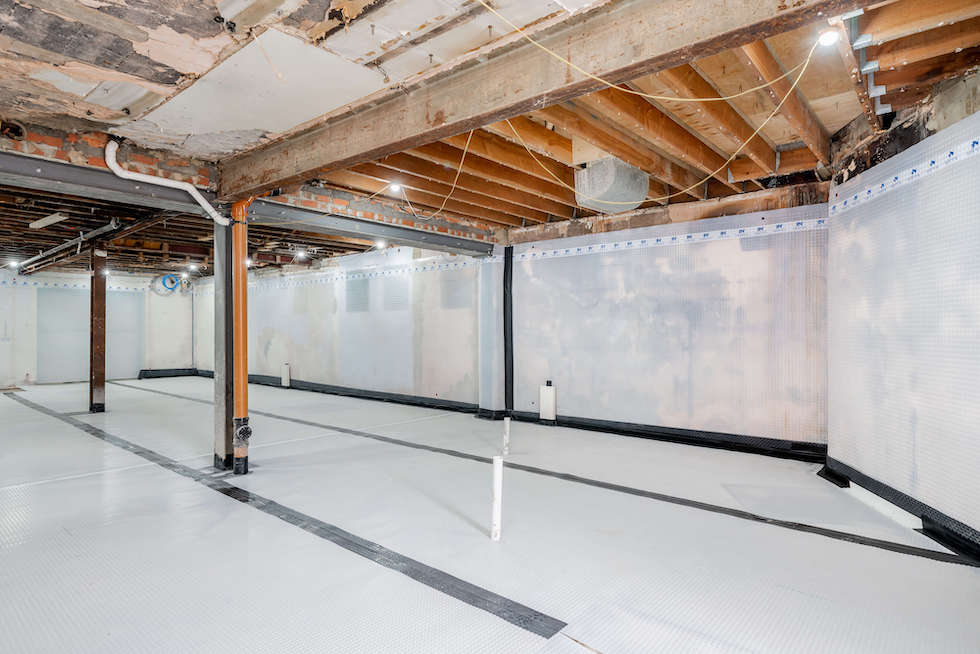 Cellar tanking system in listed building