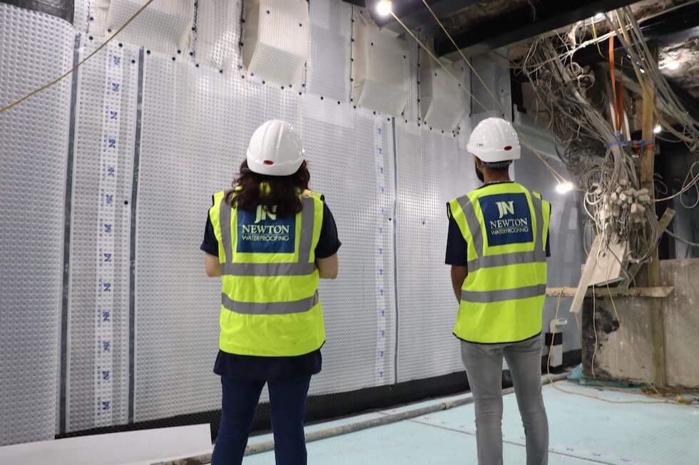 Double basement cavity drain waterproofing system